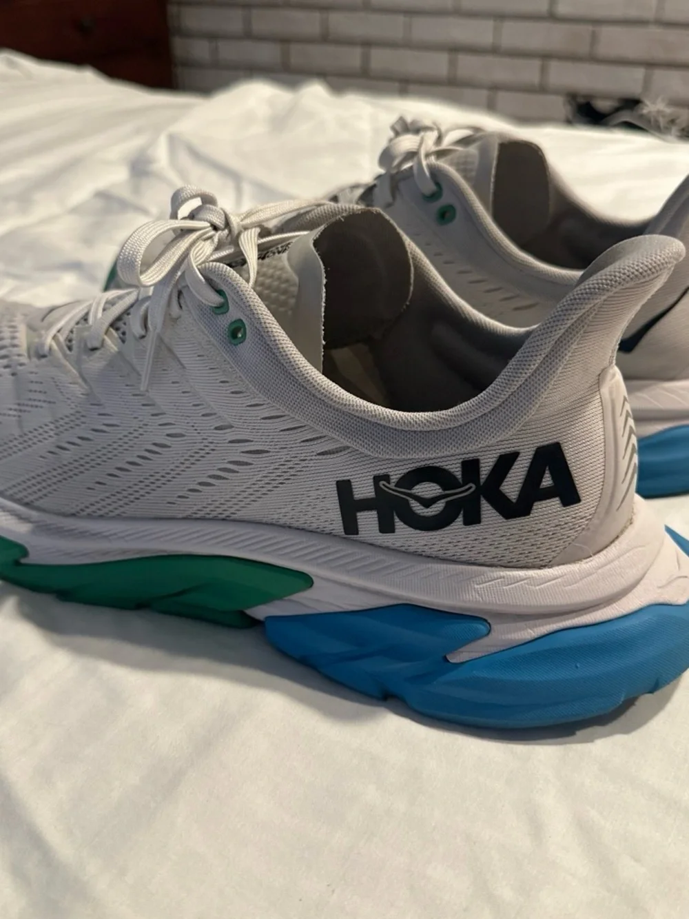 Hoka Men's White Running Shoes with Green and Blue Soles